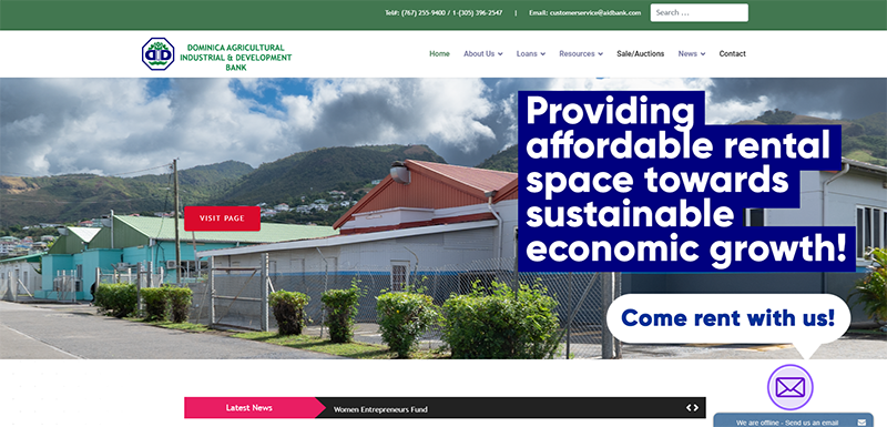 Dominica AID Bank website displayed on a laptop